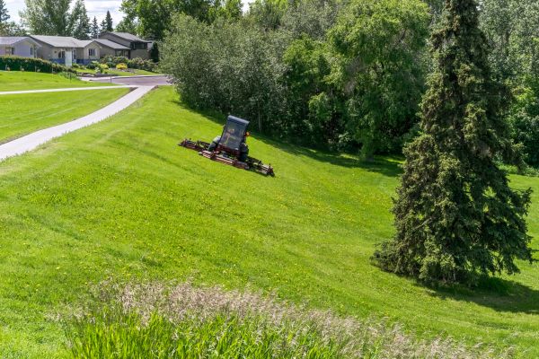 Cost of Sloped Area Mowing in Lilburn